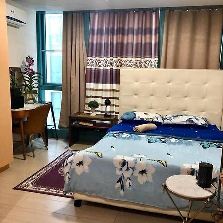 Апартаменти 1Br One Uptown Near Uptown Mall Bgc Маніла Екстер'єр фото